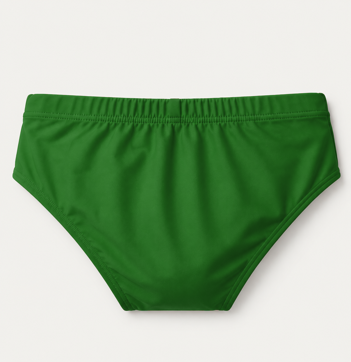 A pair of solid green bikini-style underwear laid flat against a light off-white background.